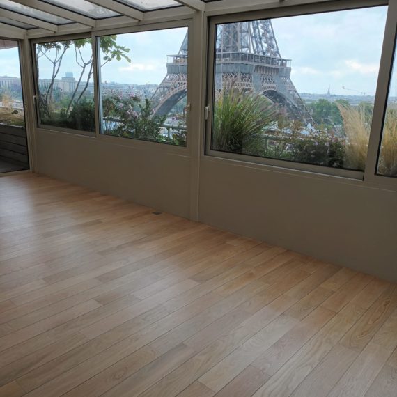 Un ponçage et une rénovation parquets au pied de la Tour Eiffel